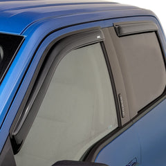 Auto Ventshade ventvisor on a crew cab truck deflects rain yet allows airflow.