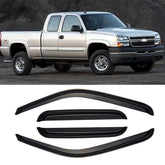 AWVRG out-channel window visor on Silverado 1999-2006 enhances rain protection while cruising with windows down.