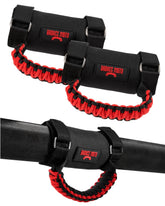 Badass Moto grab handle 2-pack on rugged roll bar for secure passenger grip.