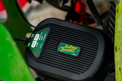 Battery Tender integrated mount bracket with screw holes for secure installation