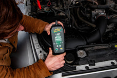 Battery Tender 4-Amp charger ring terminals and clips for universal battery compatibility.