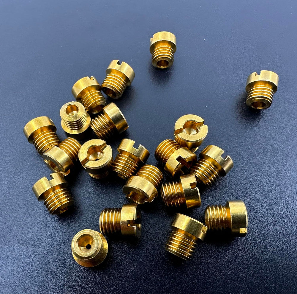 Detail view of 72-73 jets showing fine threading and fit.