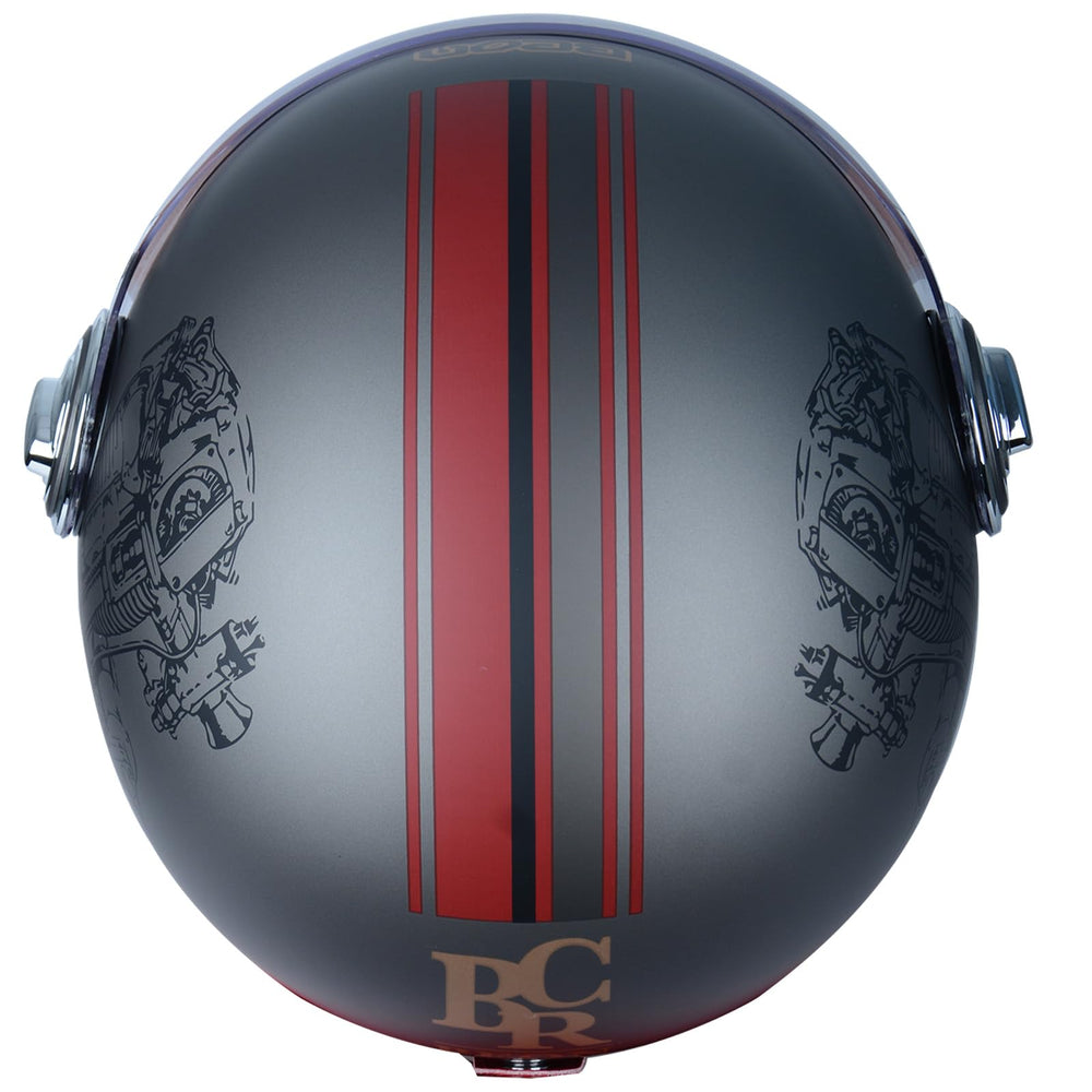 BEON open-face helmet quick-release buckle for one-gloved hand fastening.