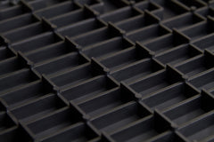 Big Floors GarageTrac tile made of durable copolymer for heavy-duty garage use.