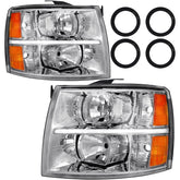 Bincmay Silverado driver-side headlight with chrome housing and amber reflector improves visibility.