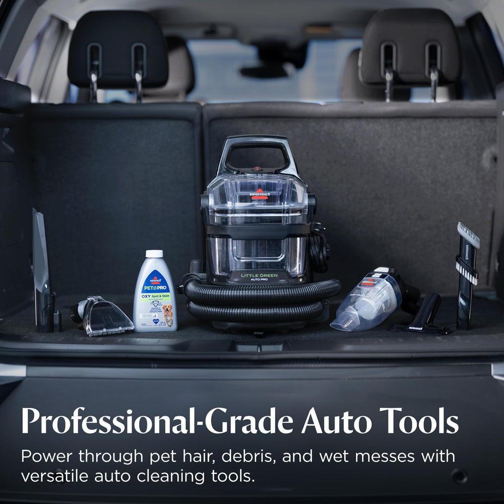 Pet hair remover attachment lifting fur from car upholstery on BISSELL Little Green Auto Pro