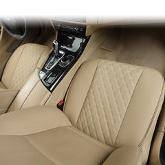 Black Panther PU seat cover with geometric-embroidery and front-pocket accent.