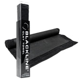 Blackline Clay Towel polymer layer close-up lifting tar from paint for surface decontamination.