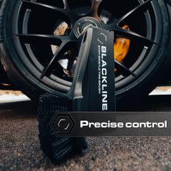 Blackline stiff bristle brush with ergonomic grip for easier scrubbing.