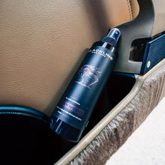 Blackline Teakwood spray action shown for quick odor refresh on the go
