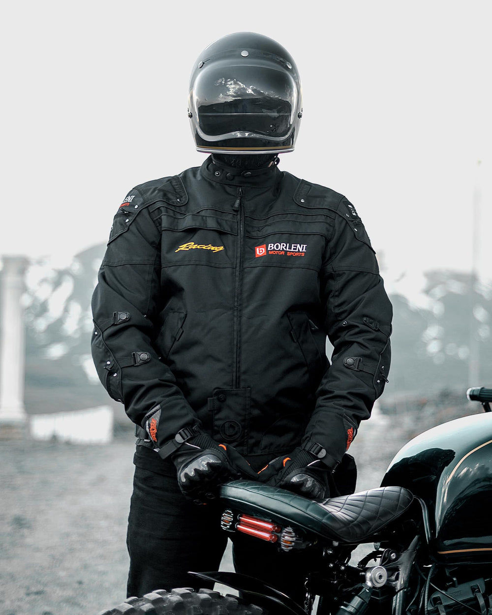 BORLENI motorcycle jacket back view highlighting reflective strip for night visibility.