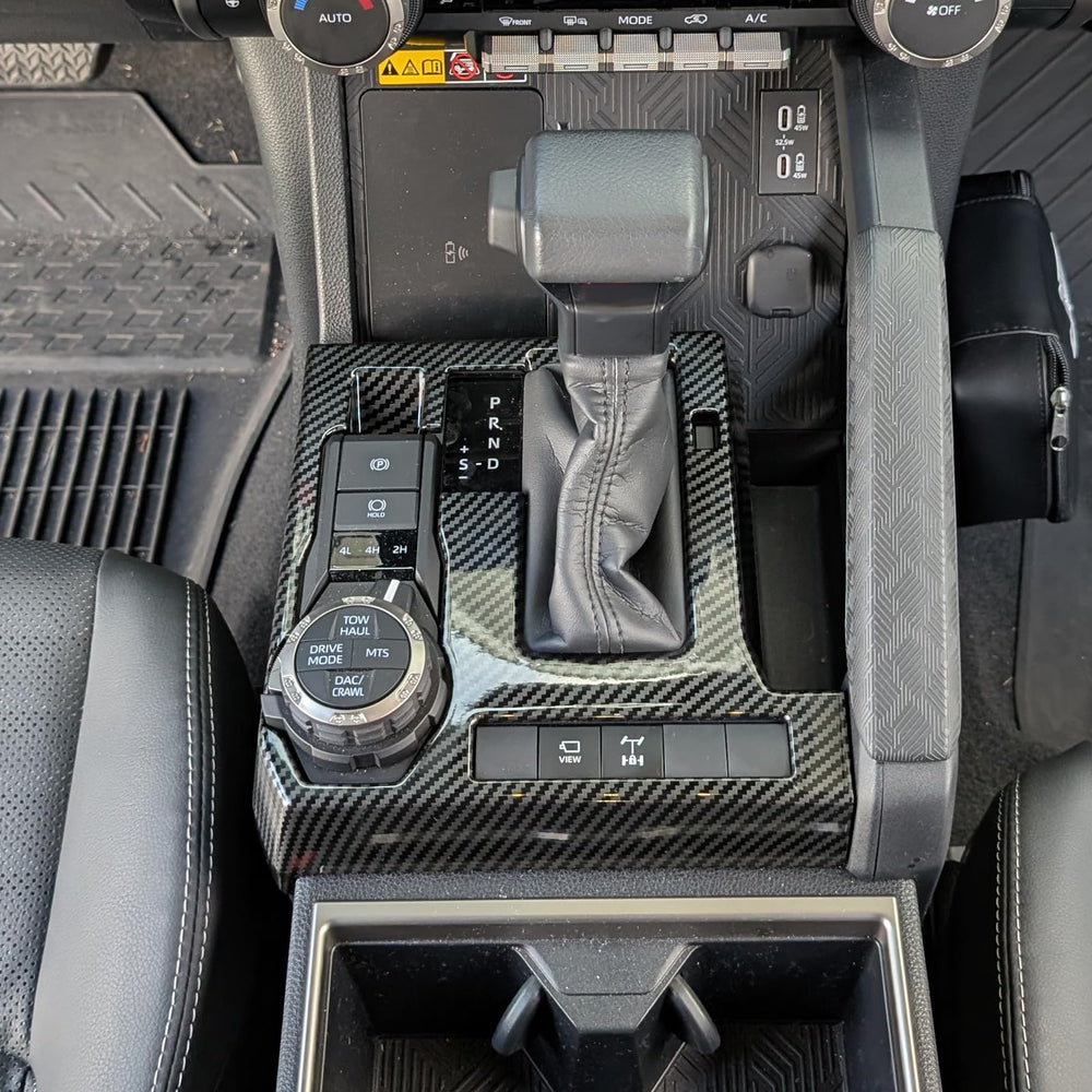BORUIEN shift panel cover with carbon fiber grain for Tacoma interior protection.