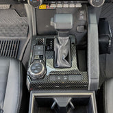BORUIEN shift panel cover with carbon fiber grain for Tacoma interior protection.