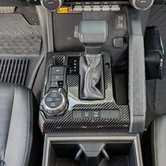 BORUIEN shift panel cover with carbon fiber grain for Tacoma interior protection.