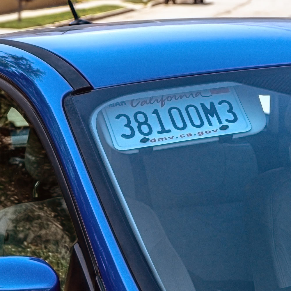BrainExploder sun visor license plate mount front view for a clean, clutter-free look.