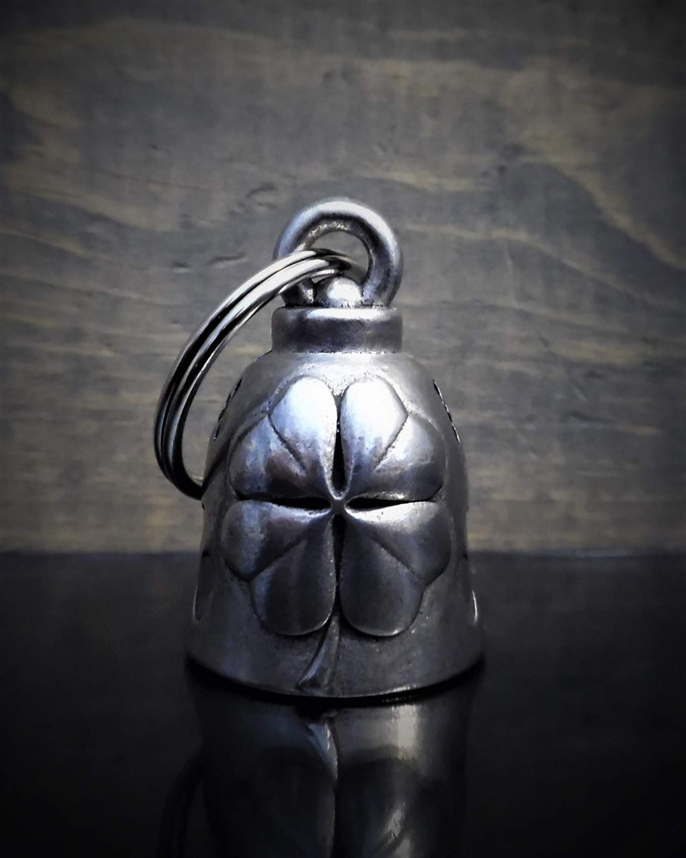 Bravo Bells Clover Bell close-up emphasizes pewter finish and tactile charm