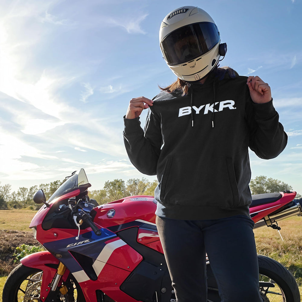 BYKR motorcycle hoodie model wearing black demonstrates versatile street-to-ride style.