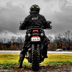 BYKR rainsuit jacket pocket zipper provides secure space for essentials.