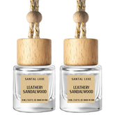 C Classy hanging car air freshener with leathery sandalwood notes enhances cabin fragrance.