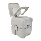 Camco 5.3-gallon portable toilet ready for camping trips and RVs.