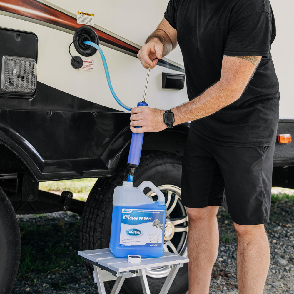 Camco de-winterize scene shows fresh water lines ready for use.