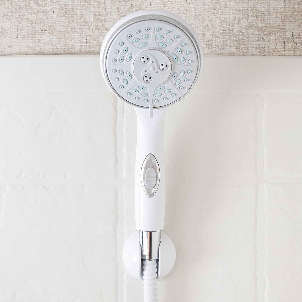 Camco RV shower head on/off switch close-up shows pause control.