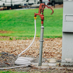 Camco TastePURE 50-foot hose in use for RV water supply.