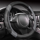 CAR PASS Line Rider soft-touch steering cover on a 14.5–15 inch wheel for comfortable grip.