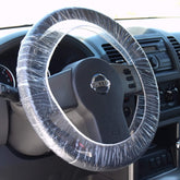 CarBowz steering wheel protector clear cover in a 100-pack, protects interiors from grease and dirt.