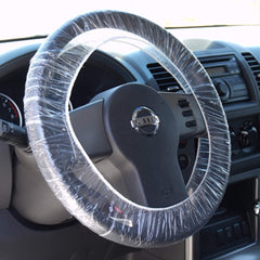 CarBowz steering wheel protector clear cover in a 100-pack, protects interiors from grease and dirt.