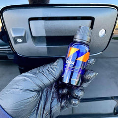 Production date printed on CARPRO DLUX bottle.