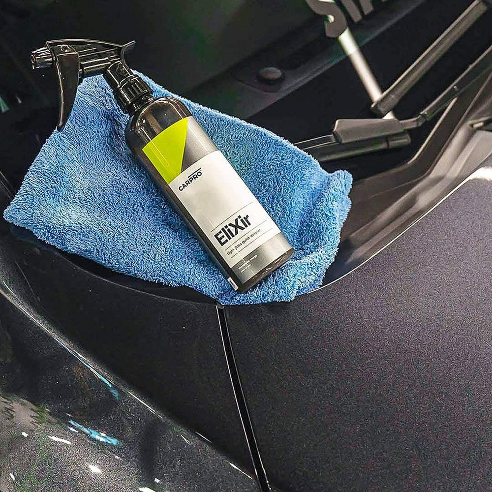 CARPRO Elixir used on a multi-surface panel for shine