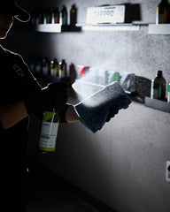 CARPRO EliXir Quick Detailer spray-on panel demonstrating hydrophobic surface beading