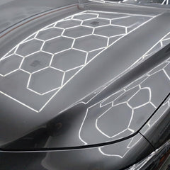 CARPRO EliXir Quick Detailer application scene showing even spray coverage