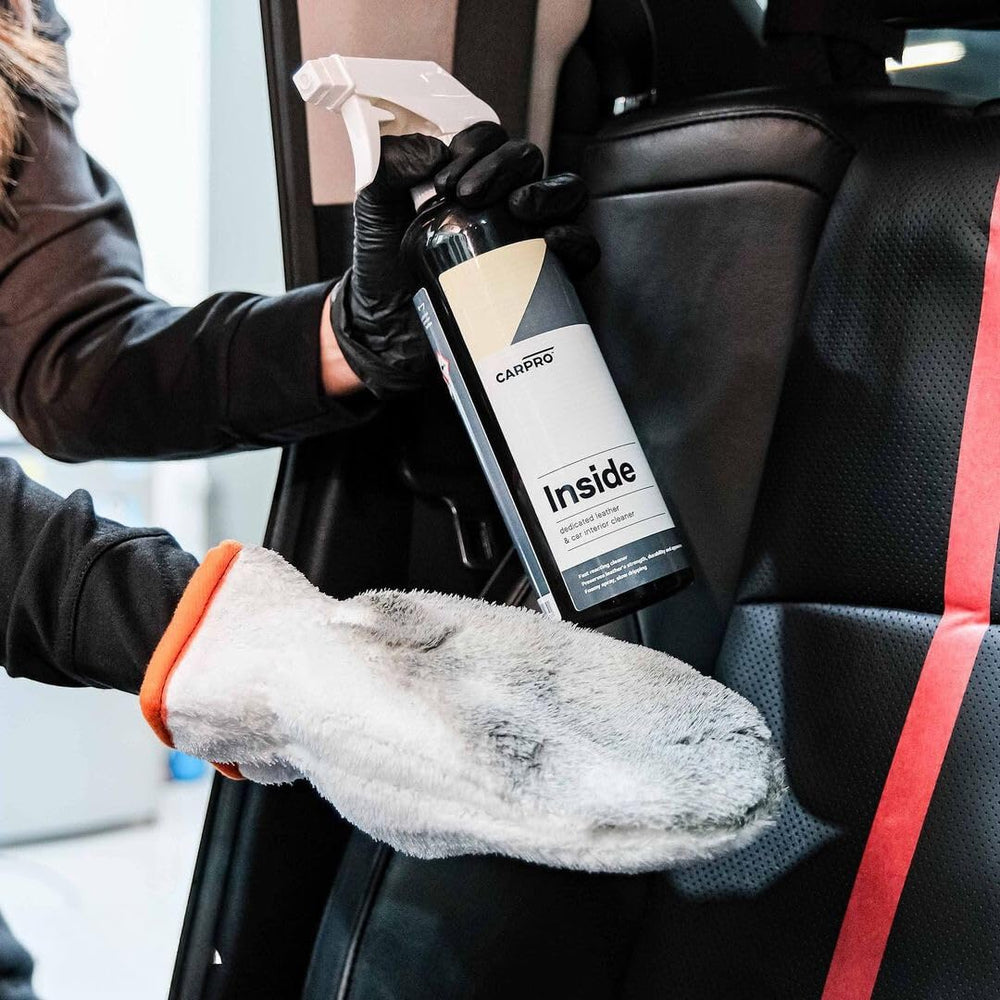 CARPRO Inside applying with microfiber cloth on vinyl surface for gentle cleansing.