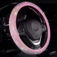 Carwales pink bling steering wheel cover with rhinestones adds feminine style and grip.