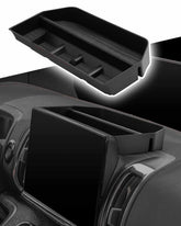 CDEFG behind-screen dash storage tray keeps Expedition essentials within reach.
