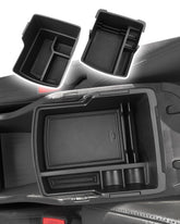 CDEFG Double Layer Armrest Storage Box upper layer insert keeps essentials within reach in the Kona