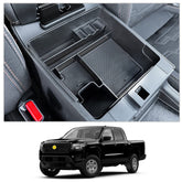 CDEFG Frontier console organizer tray close-up highlighting tidy storage and USB cable routing