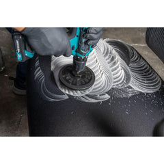 ACC506 demonstration of light stain removal on fabric surfaces.