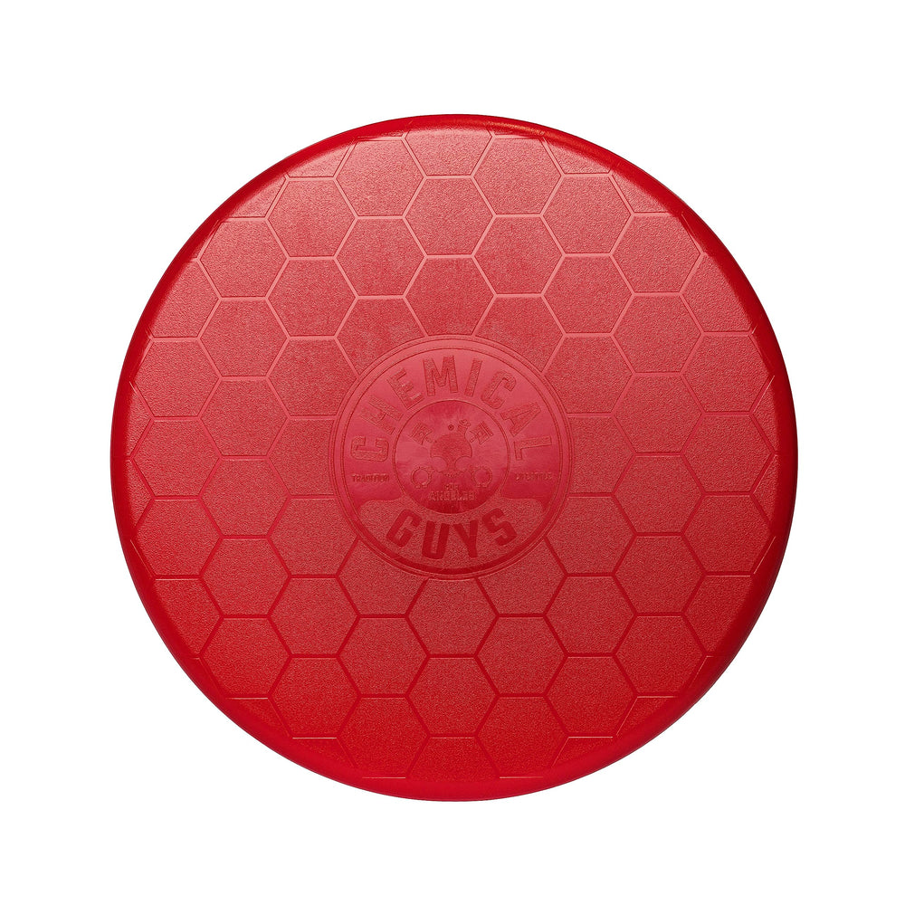 Chemical Guys IAI518 red bucket lid on a bucket used as a seat for detailing tasks.