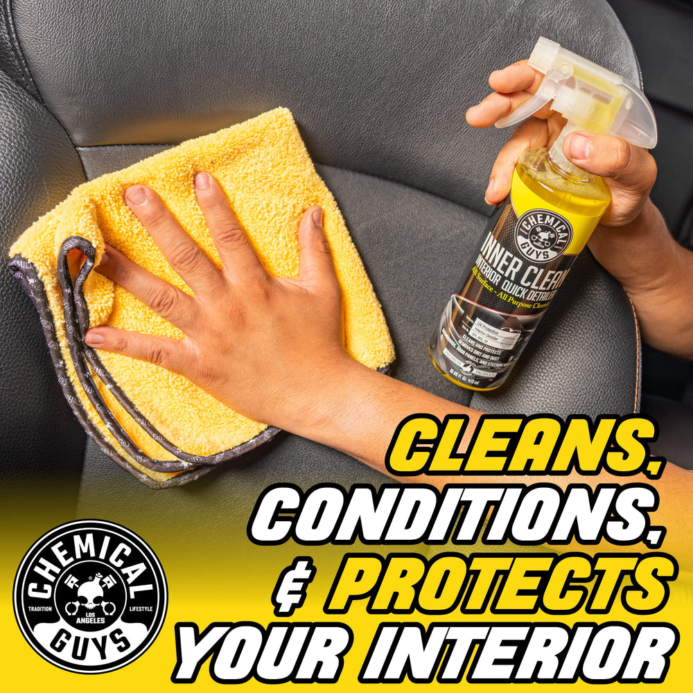 Chemical Guys InnerClean spray action on a dusty dash for fast cleaning.