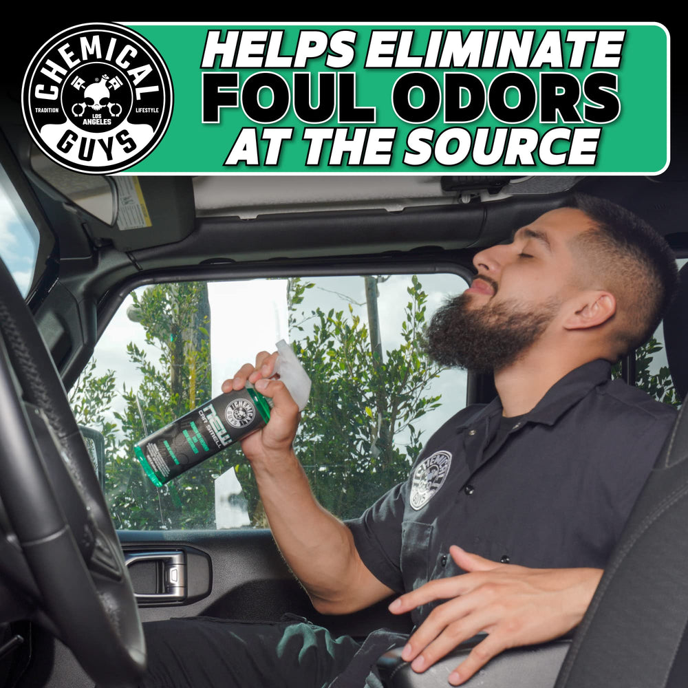Chemical Guys New Car Smell vent spray demonstrates deodorizing action directly through air vents.