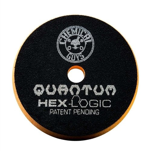 Chemical Guys Hex-Logic Quantum Orange pad during cutting action on a test panel