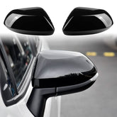 CKE Corolla Guard Cap front view in glossy black adds a sporty look while protecting mirrors.