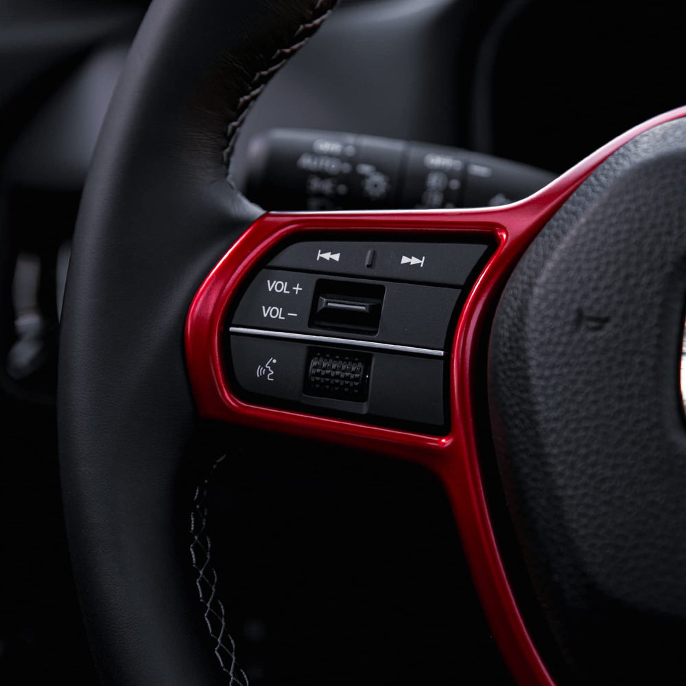 CKE dashboard trim frame in red adds a cohesive modern accent.