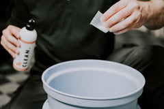 CLEAN. rinse-less wash applied to a car panel for easy, safe cleaning without water.
