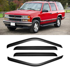 CMVT Auto window visors on a Tahoe-Yukon with smoke tint and airflow enhancement.