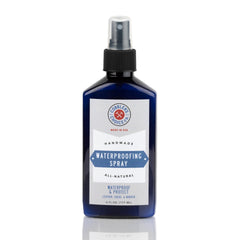 Cobbler's Choice waterproofing spray bottle applying all-natural protection for leather