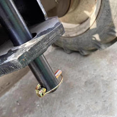 Comonc lynch pins applied to tractors, trailer couplers, and mower attachments.